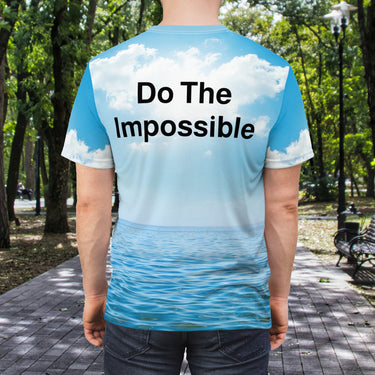 Soft, breathable activewear shirt with “Impossible Man” design, message “The Impossible Is Possible with God,” spiritual shirt for men pursuing God's unexpected possibilities, back of shirt displaying